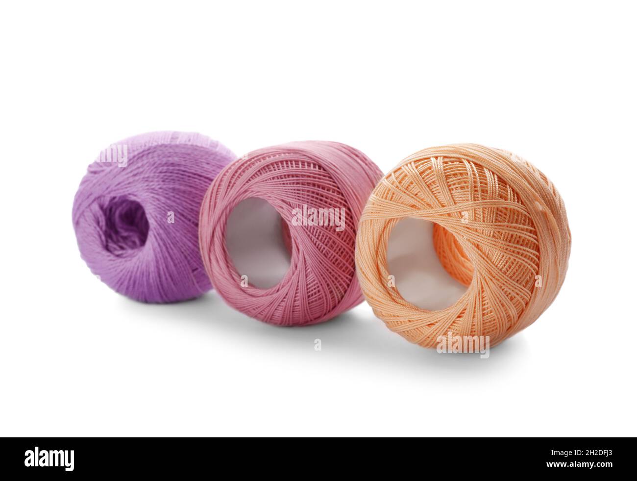 Light Colour Threads Color threads on white background Stock Photo - Alamy