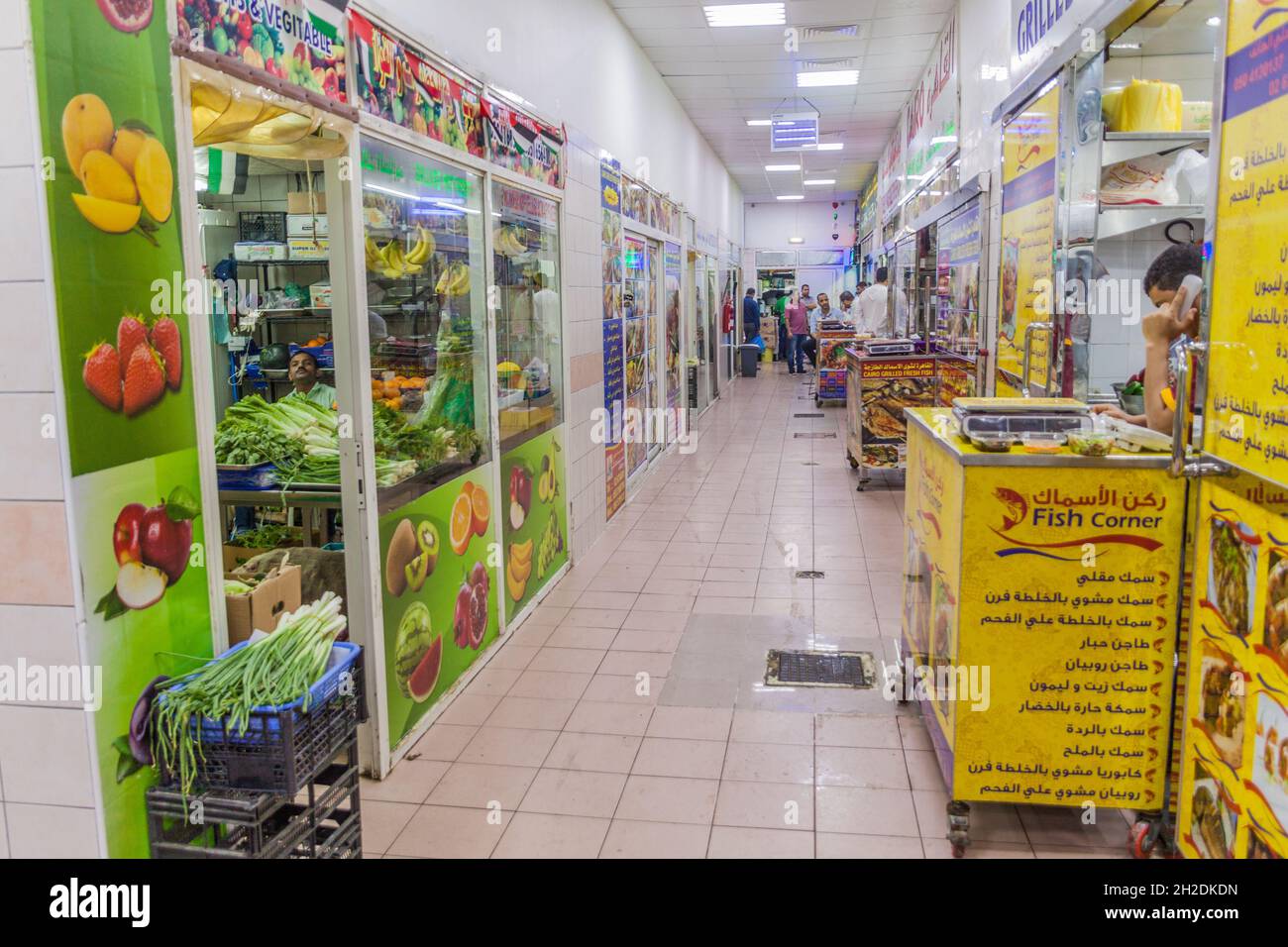 ABU DHABI, UAE MARCH 9, 2017 Fish and fruit stalls at Al Mina market