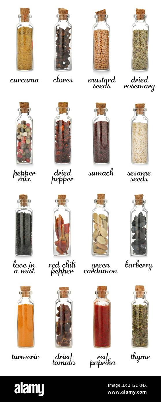 Glass bottles with different spices and herbs on white background