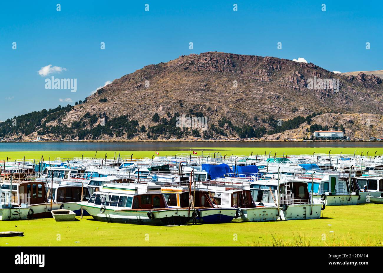 Boats docked at Puno on Lake Titicaca in Peru Stock Photo