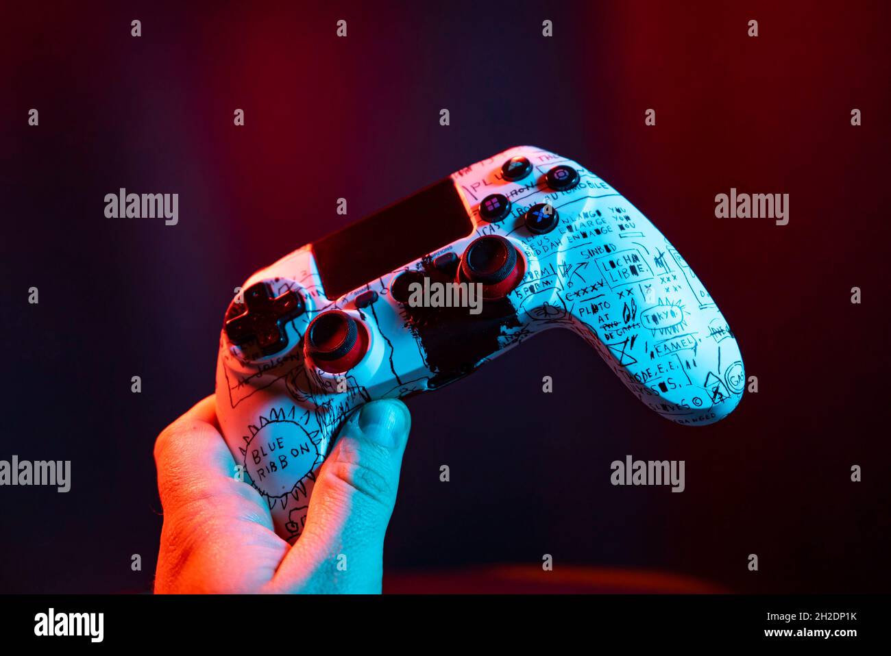 Next Gen game controller on mans hands Stock Photo