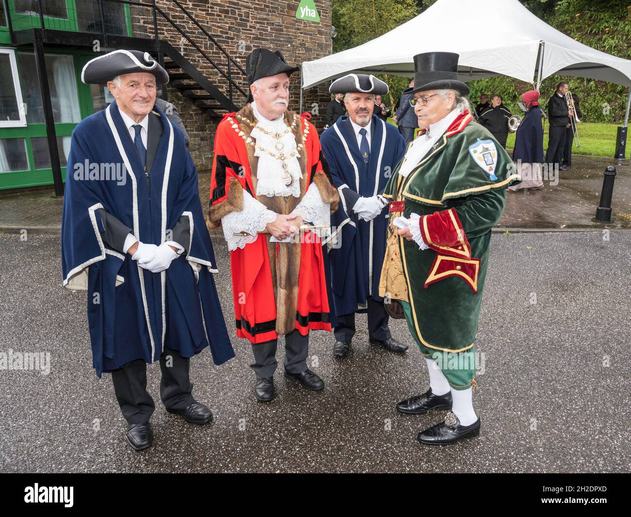 Costumed celebration marking 150 years of rail in Okehampton, Devon. Mayor Bob Tolley chats with town crier Ros Charlton Chard. Stock Photo