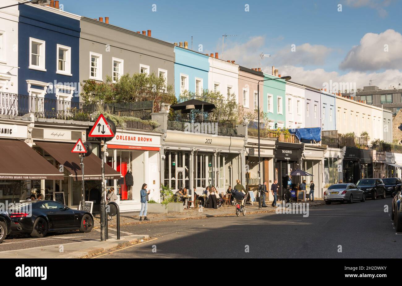 Shops and houses on Westbourne Grove, Notting Hill, London, W11, U.K. Stock Photo