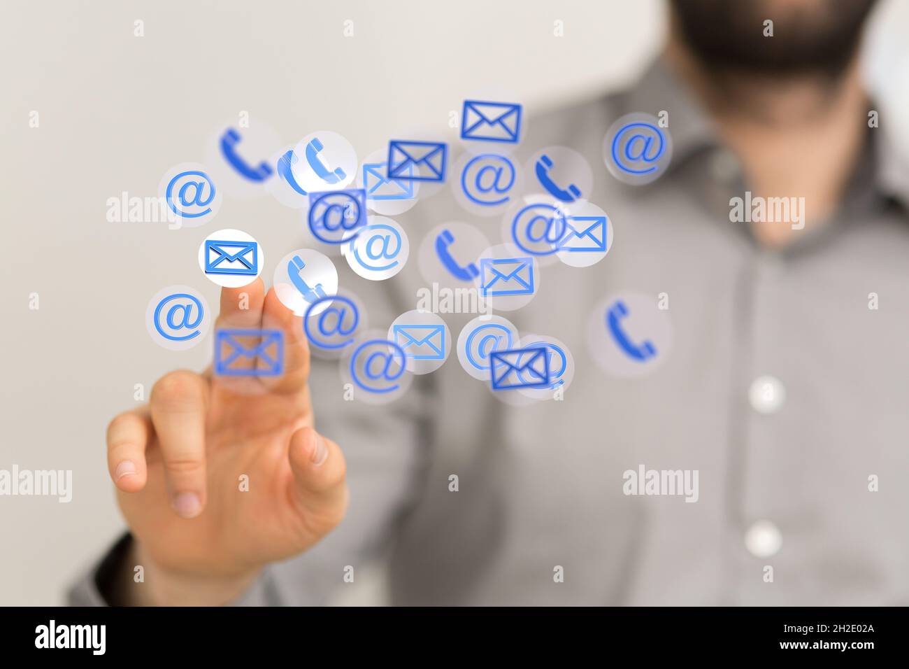 Male clicking at email and phone icons-communication and feedback ...