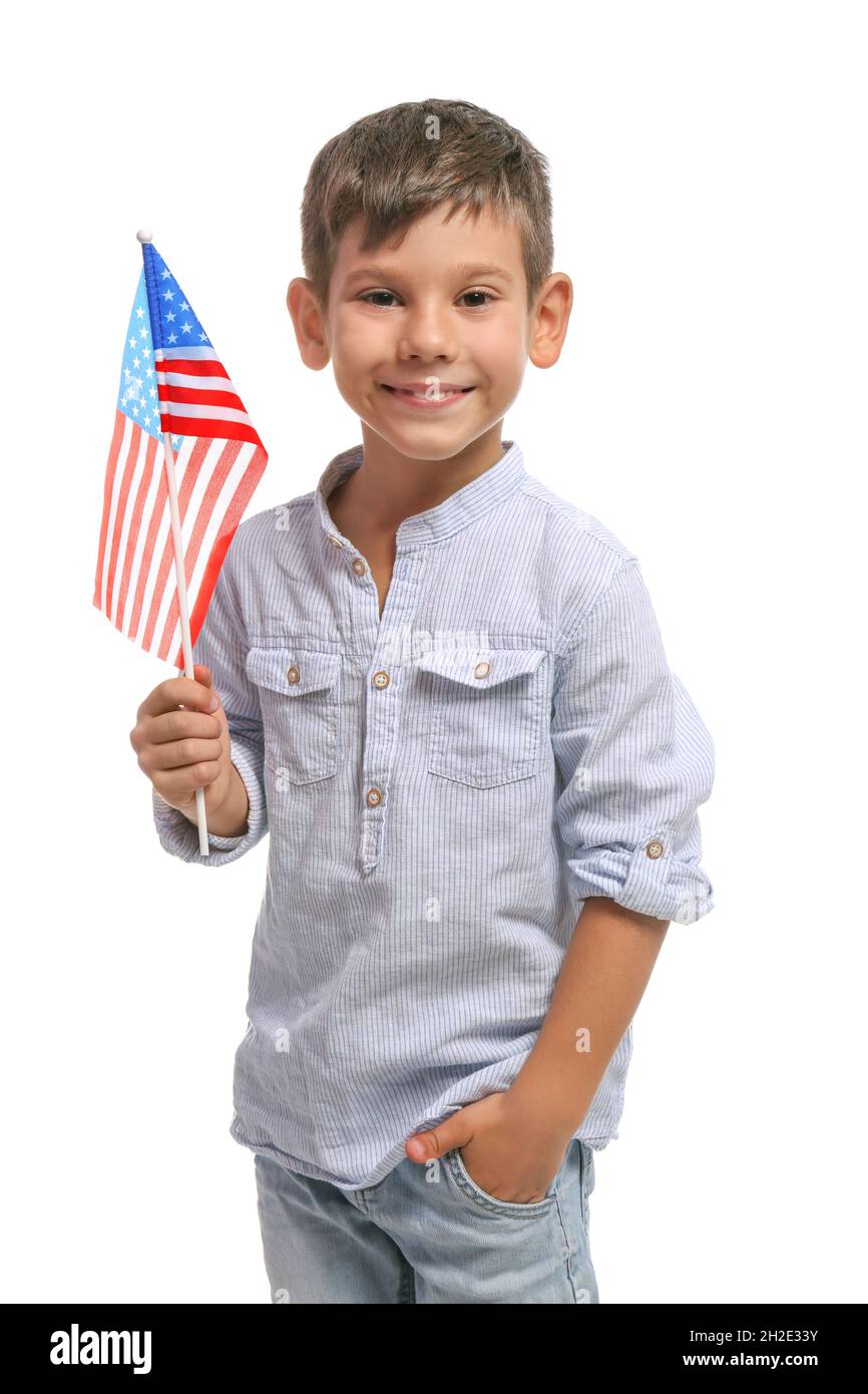 Portrait of cute little boy with American flag on white background ...