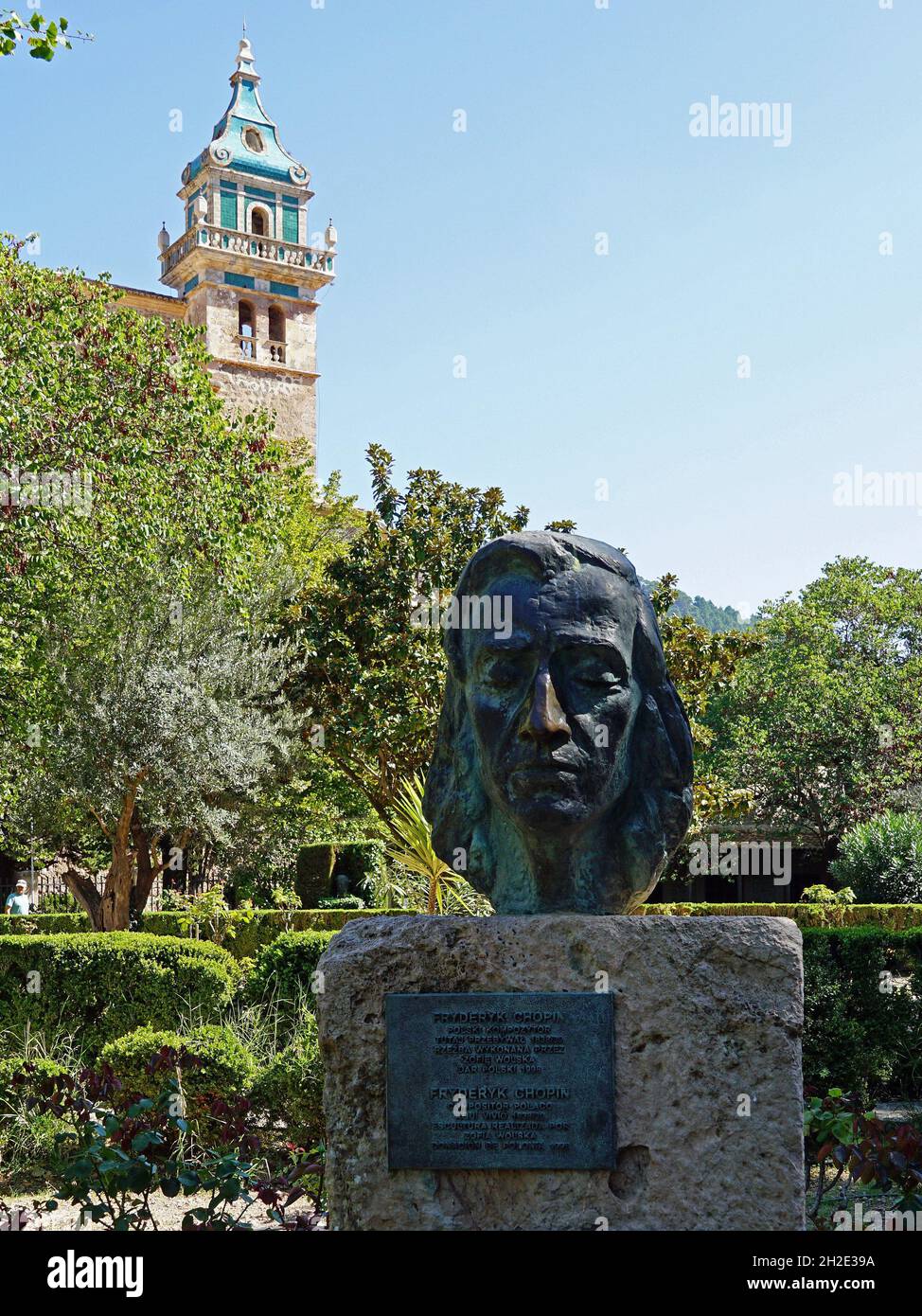Bust of Polish composer Frederic Chopin and Carthusian Monastery in the background. Valldemossa, Majorca, Spain 30.09.2019 Stock Photo