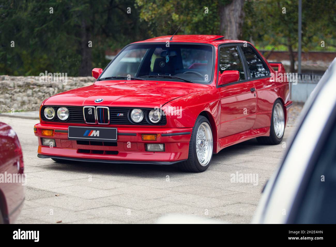 Reocin, Cantabria, Spain - October 2, 2021: Exhibition of classic vehicles. The first BMW M3 was based on the E30 3 Series and It was presented to the Stock Photo