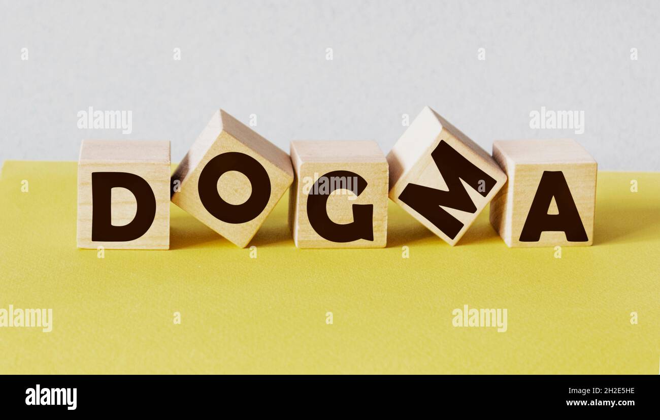 Word DOGMA made from building blocks isolated on light background Stock Photo