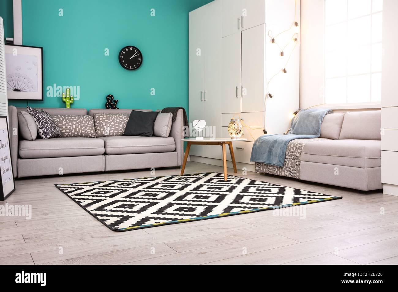 Modern living room interior with stylish sofas and carpet Stock Photo ...