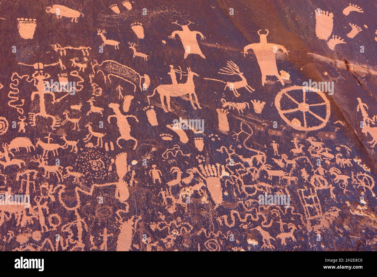 Petroglyphs on Newspaper Rock at Newspaper Rock State Historical Monument in Canyonlands, Utah Stock Photo