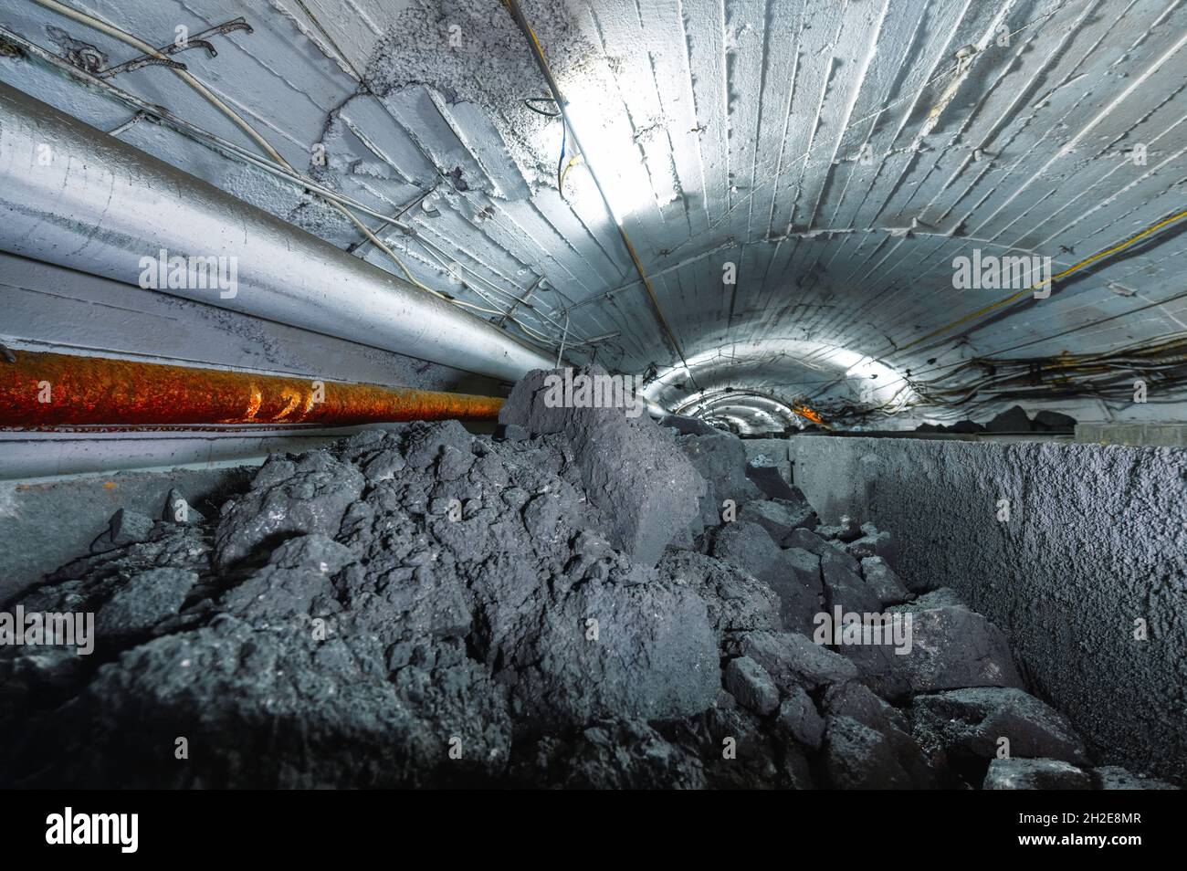Mine cart filled with ore and stones Stock Photo