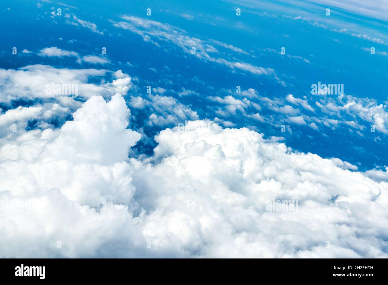 Beautiful clouds seen from aircraft in mid-air. The plane is flying over Ontario in Canada in the month of October 2021 Stock Photo
