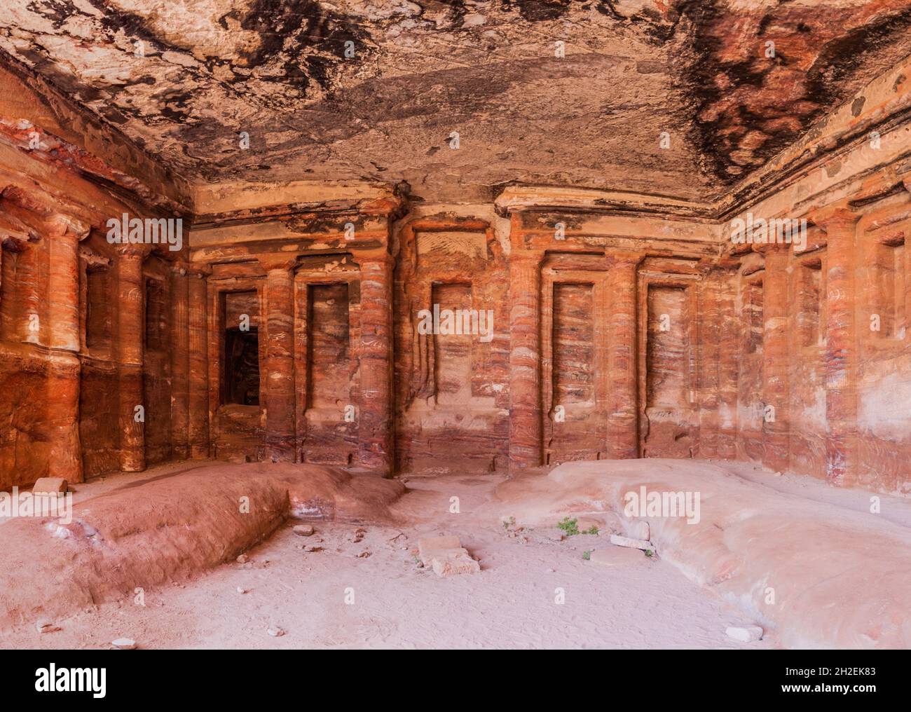 Colored Triclinium in the ancient city Petra, Jordan Stock Photo