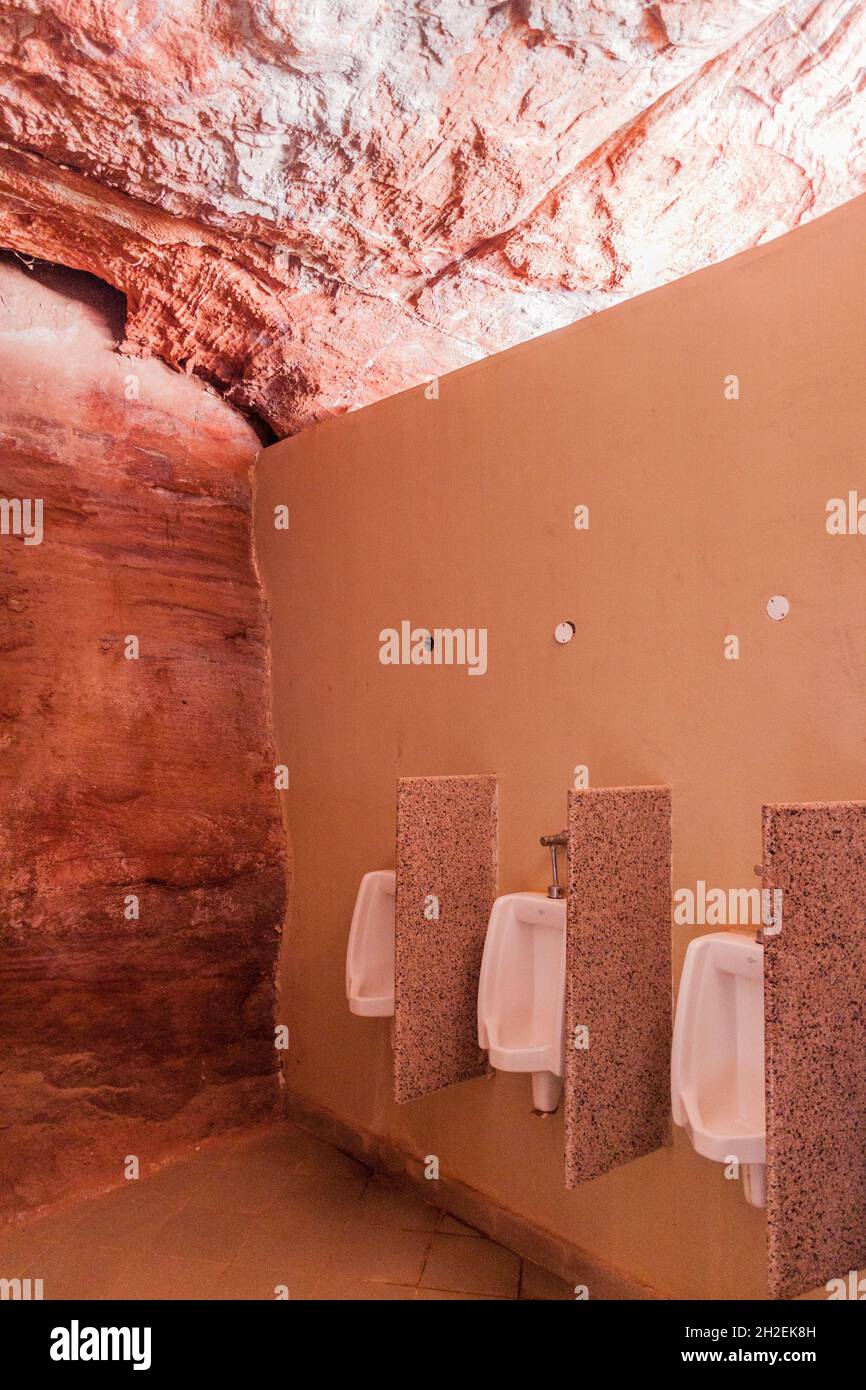 Cave public bathroom in the ancient city Petra, Jordan Stock Photo