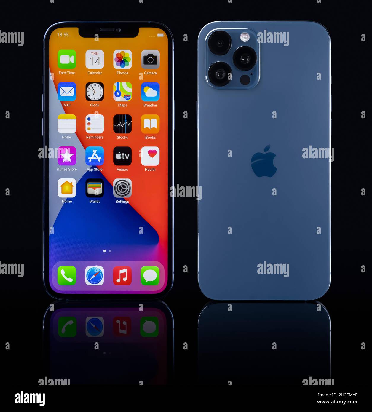 Galati, Romania - October 14, 2021: Studio shot of new Apple iPhone 12 Pro Max blue color, display front home screen, back view with Apple logo. Isola Stock Photo