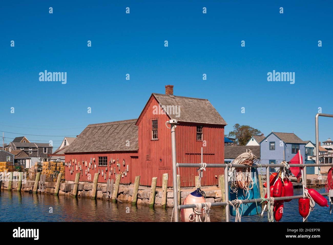 Historic red fishing shack, Motif No. 1, seen from New England Coastal Village of Rockport Massachusetts seen on a sunny day Stock Photo
