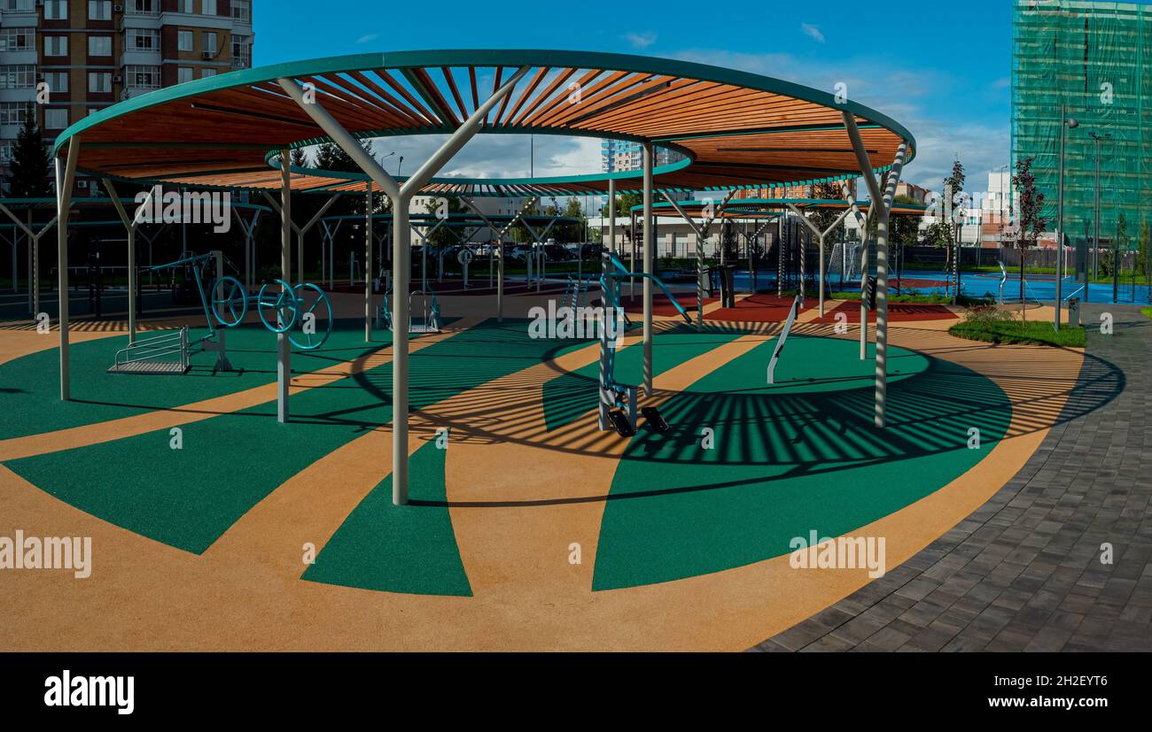 Exercise equipment for physical therapy on the site in front of the hospital. Physical activities for disabled people Stock Photo