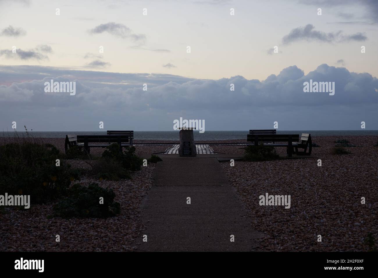 View of Aldwick beach and sea with seats on an early morning in October 2021. Stock Photo