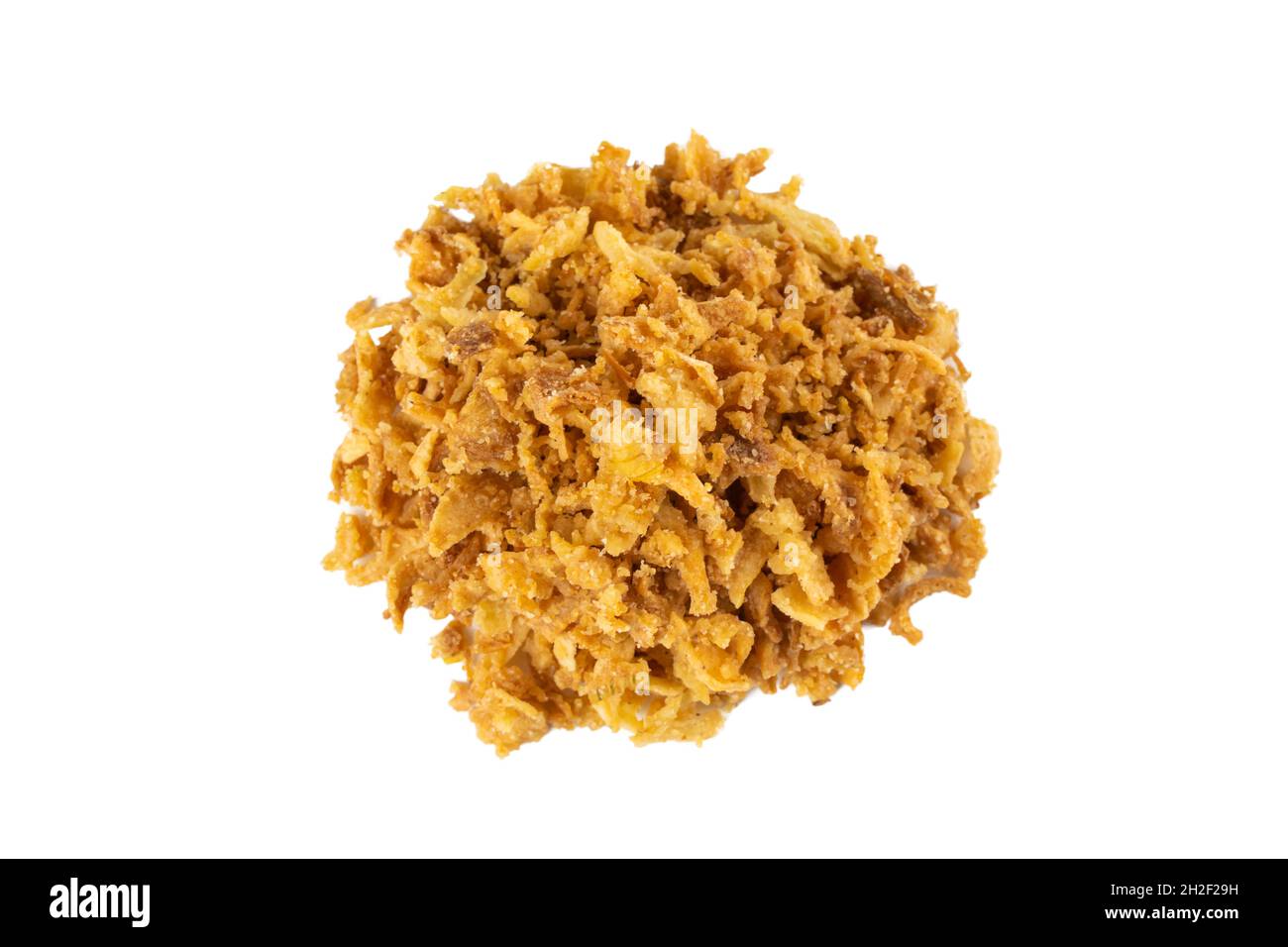Crispy carmelized fried onion flakes heap isolated on white background