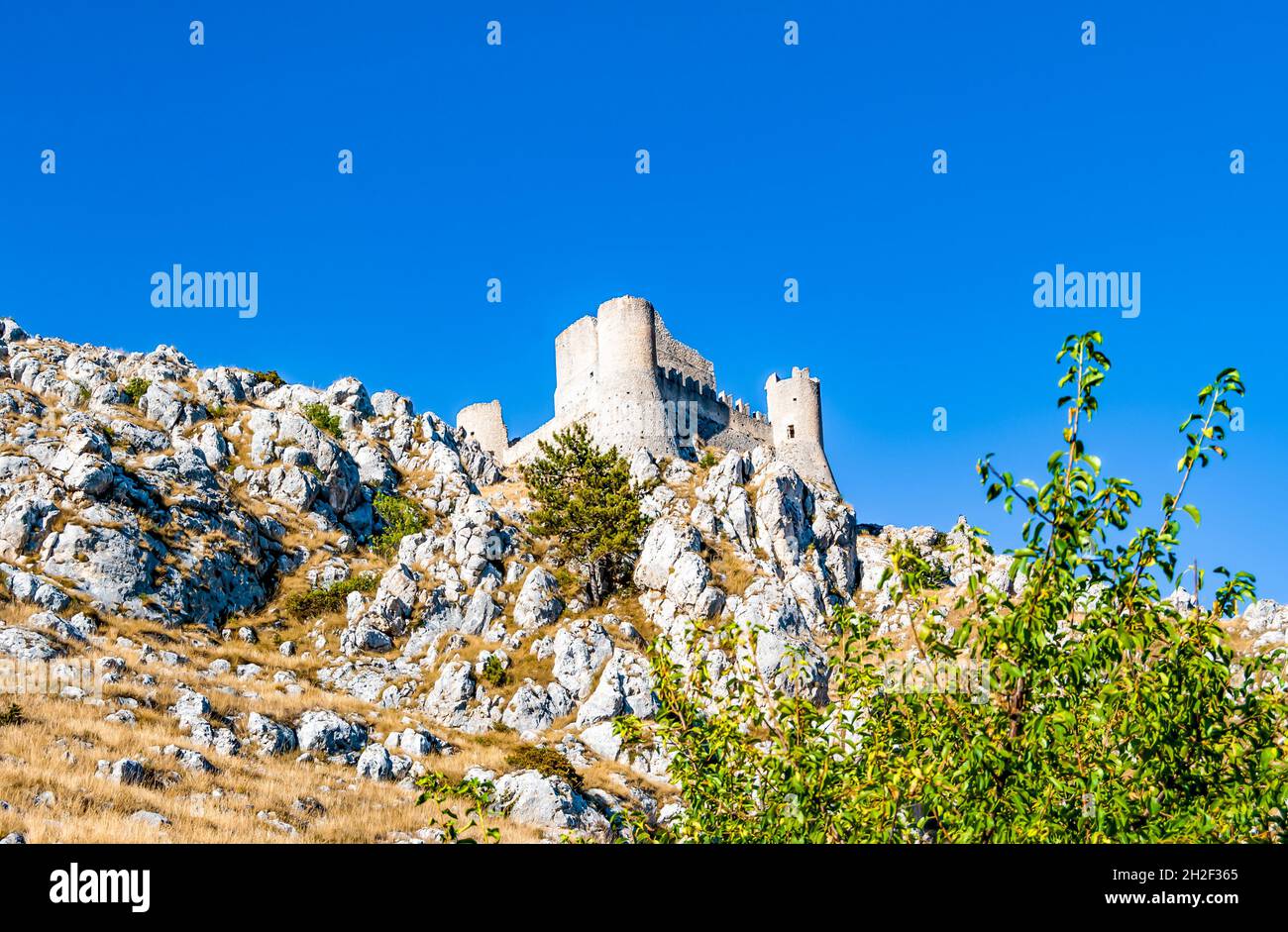 Panoramic view of the medieval mountaintop castle of Rocca Calascio, in the Apennines, in the province of L'Aquila, Abruzzo region, Italy Stock Photo