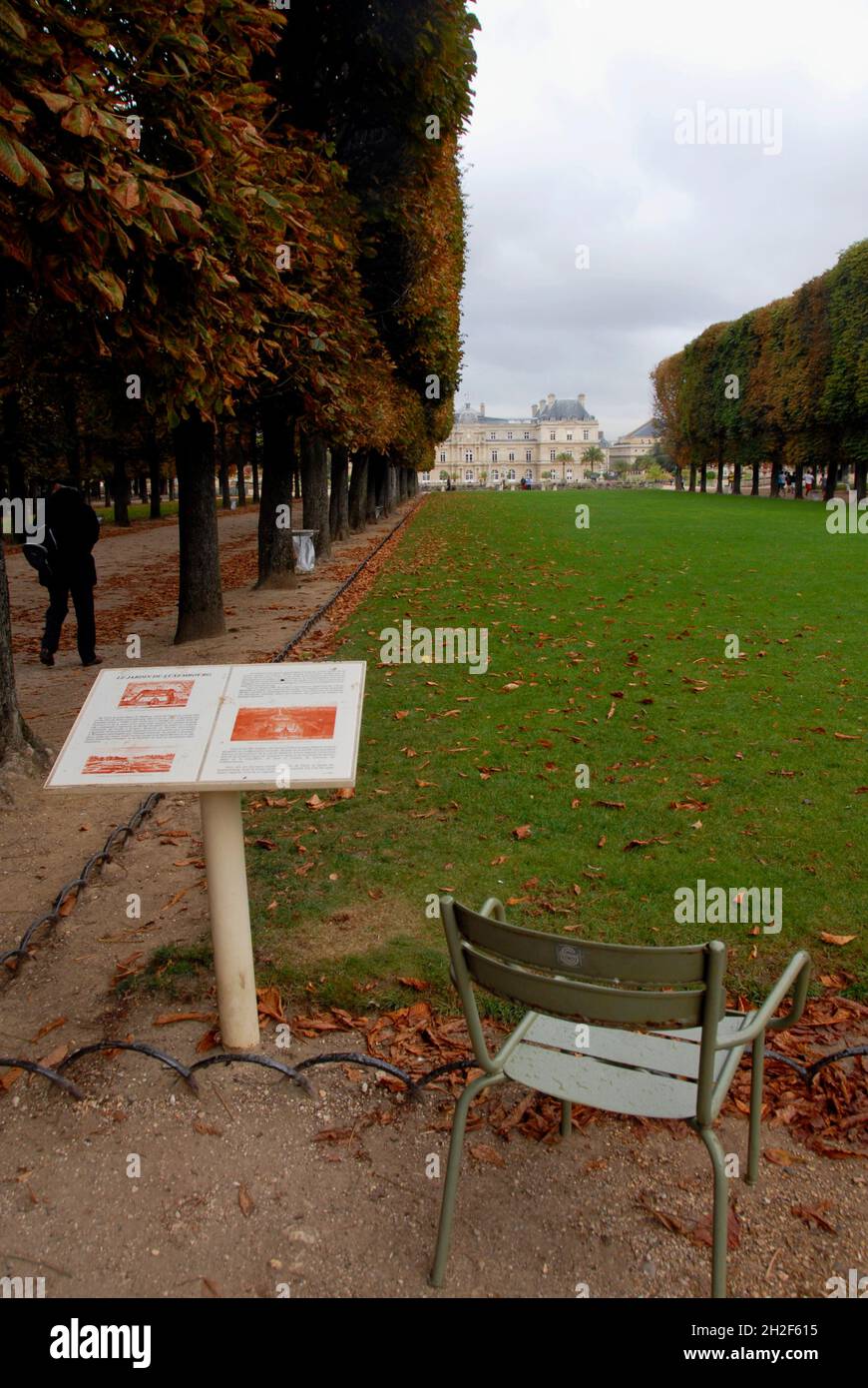Le Jardin du Luxembourg, Paris, France with seat and guide notice and avenues of trees Stock Photo