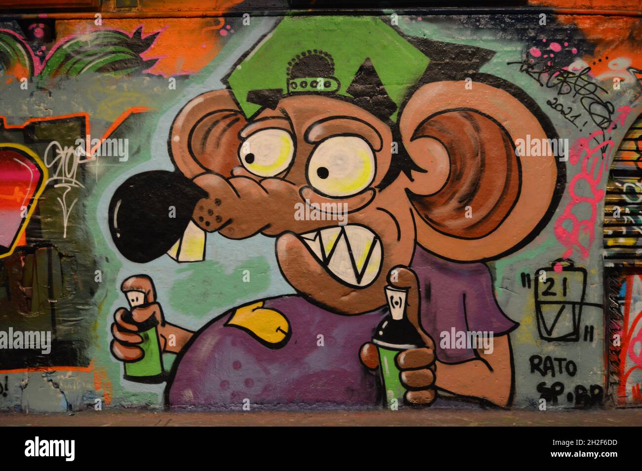 London, UK. October 14, 2021. Colourful artwork and murals inside the Leake Street Graffiti Tunnel in London. Stock Photo