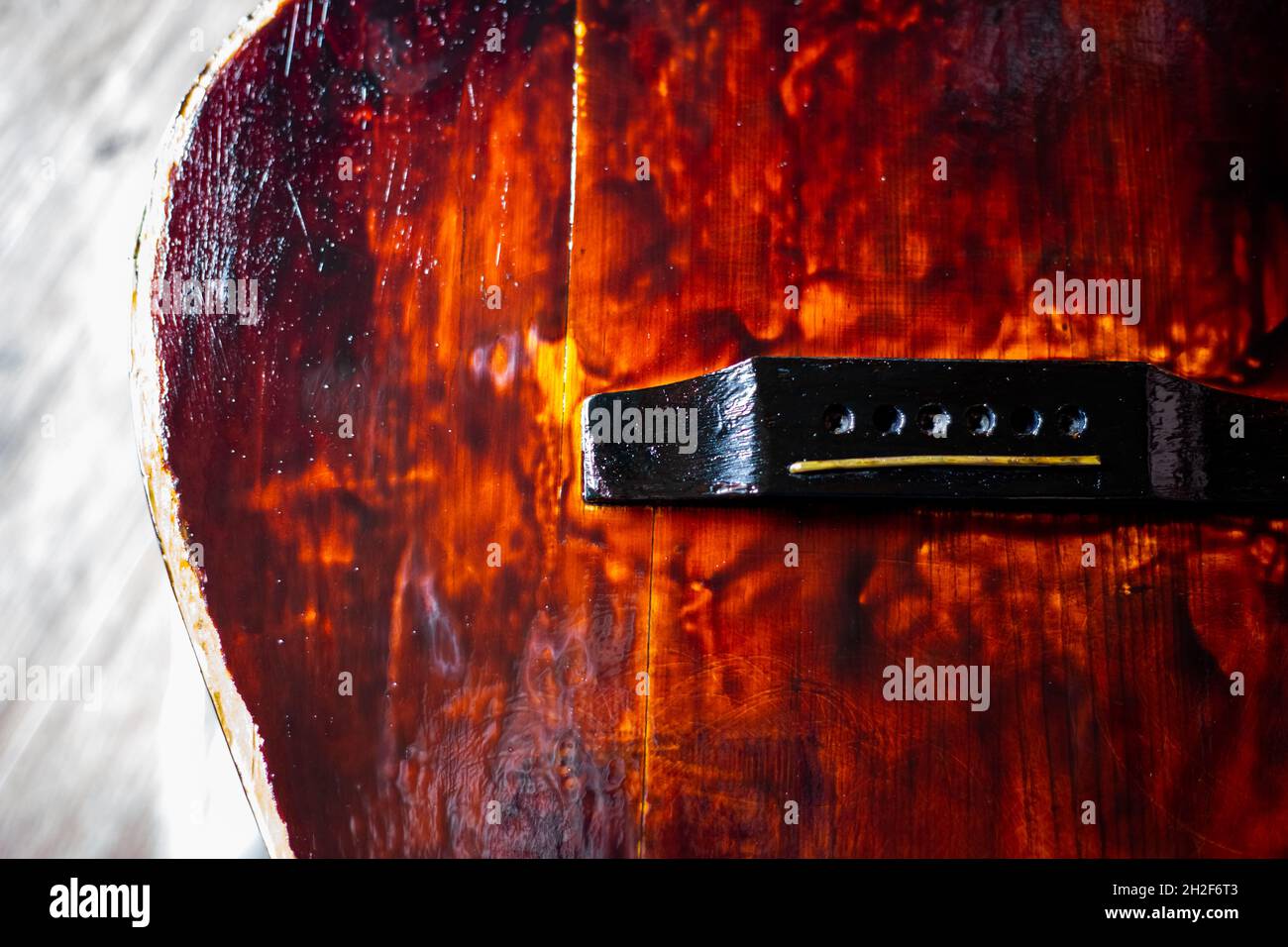 Painting an old guitar with varnish. Repair of vintage musical