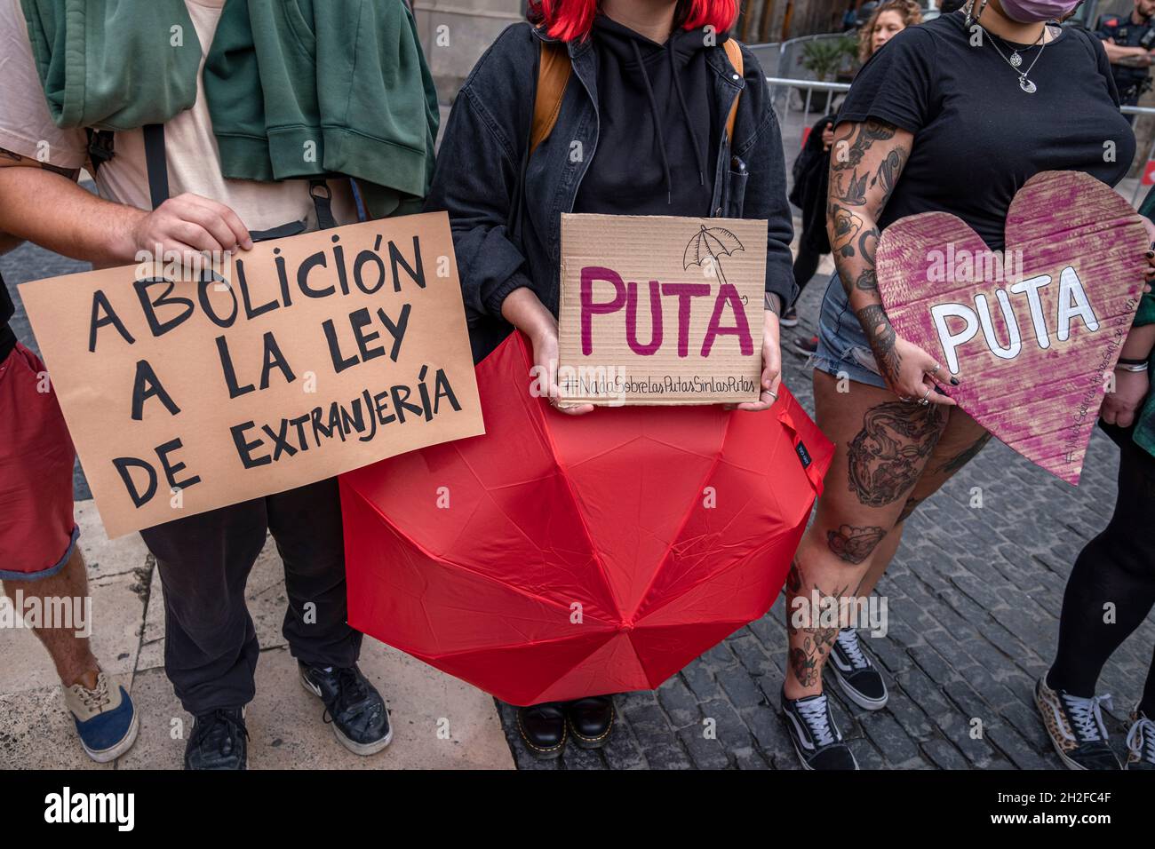 Protesters are seen displaying placards against the abolition of  prostitution, during the demonstration.Collectives in defense of practicing  prostitution understood as a labour right have gathered in Plaza Sant Jaume  following the announcement