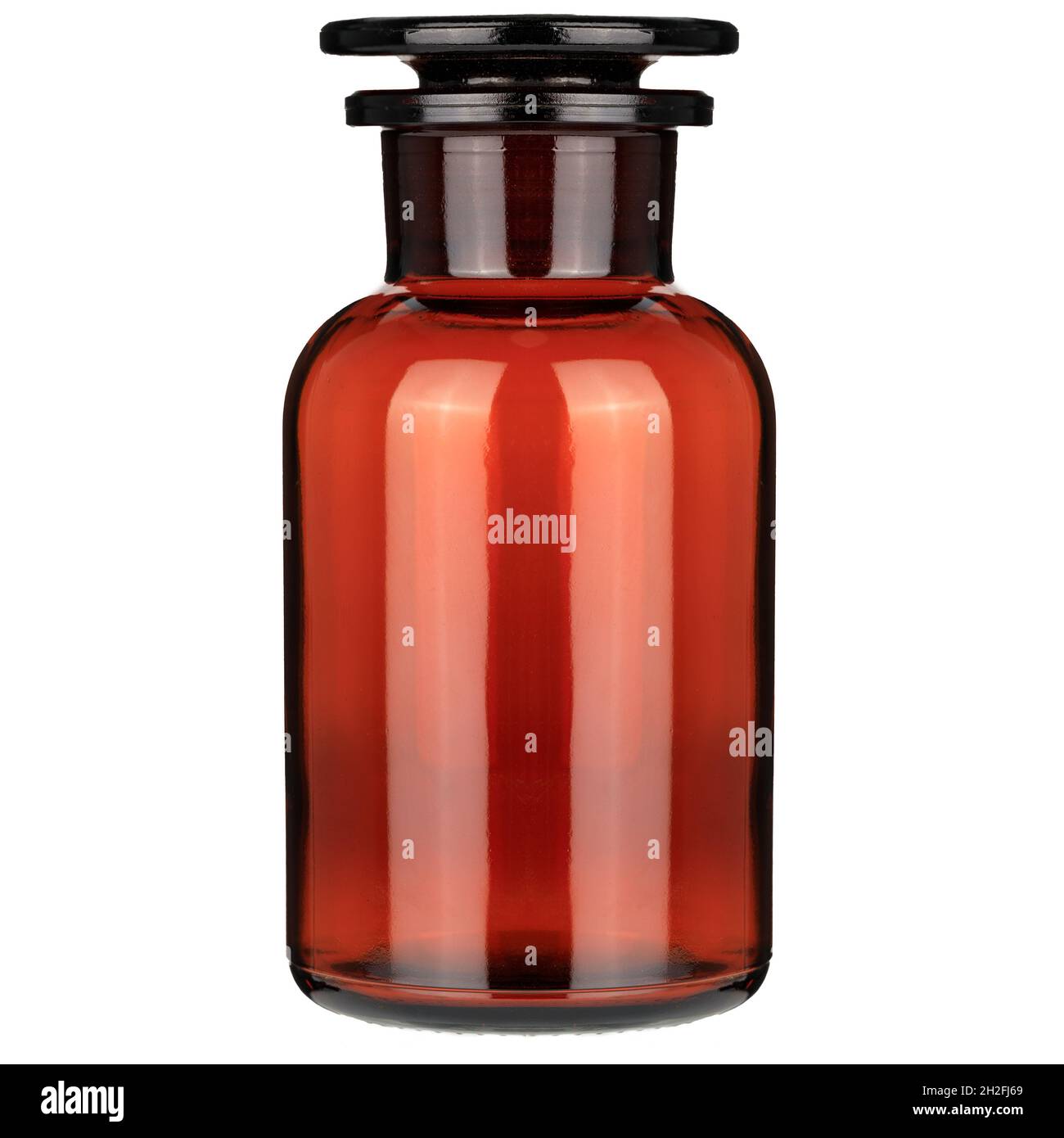 Closed clasisc medical bottle of amber color glass. Glass jars with