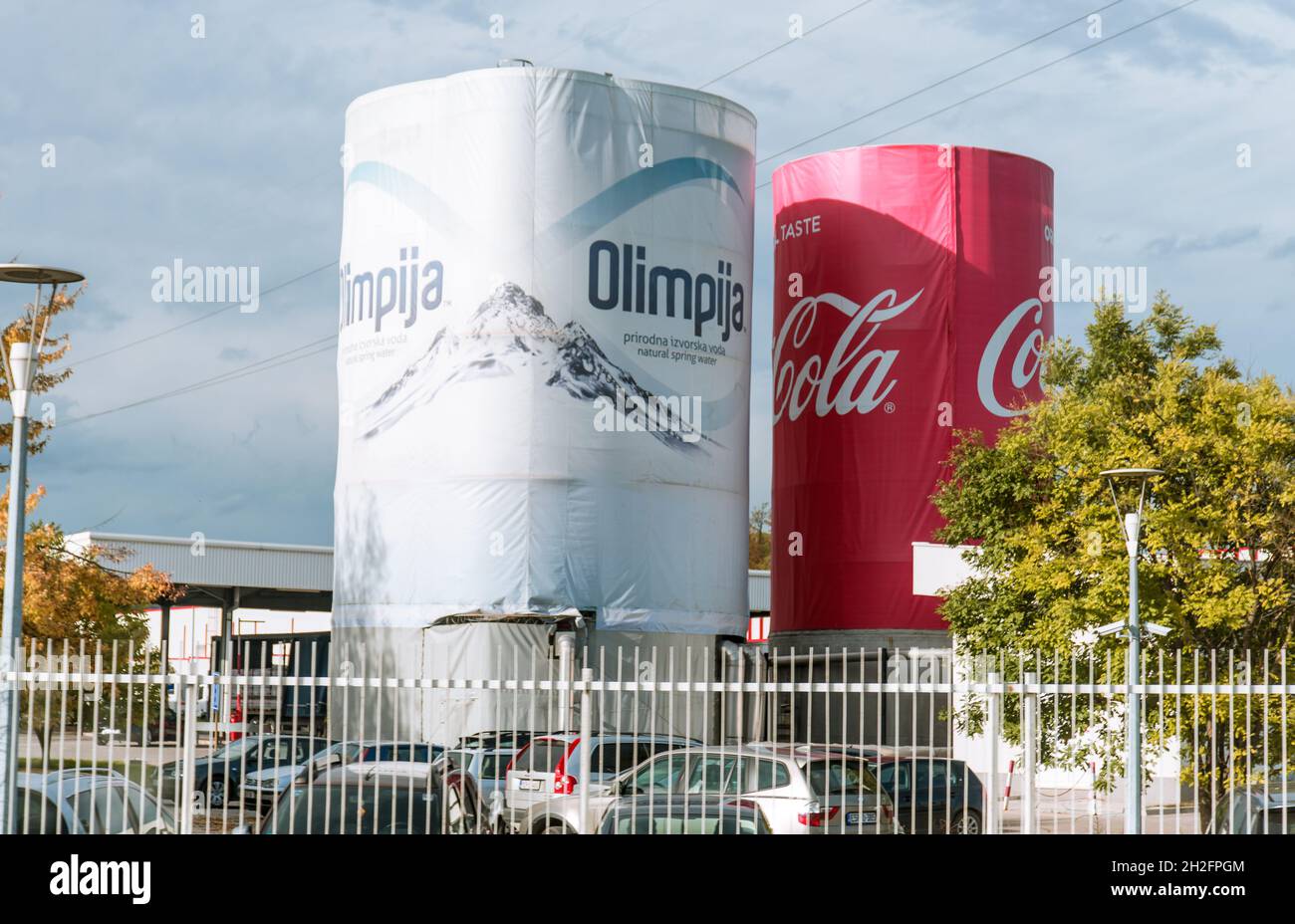 Sarajevo, Bosnia and Herzegovina - 10.22.2021: Olimpija and Coca Cola logo headquarters in Binjezevo Stock Photo