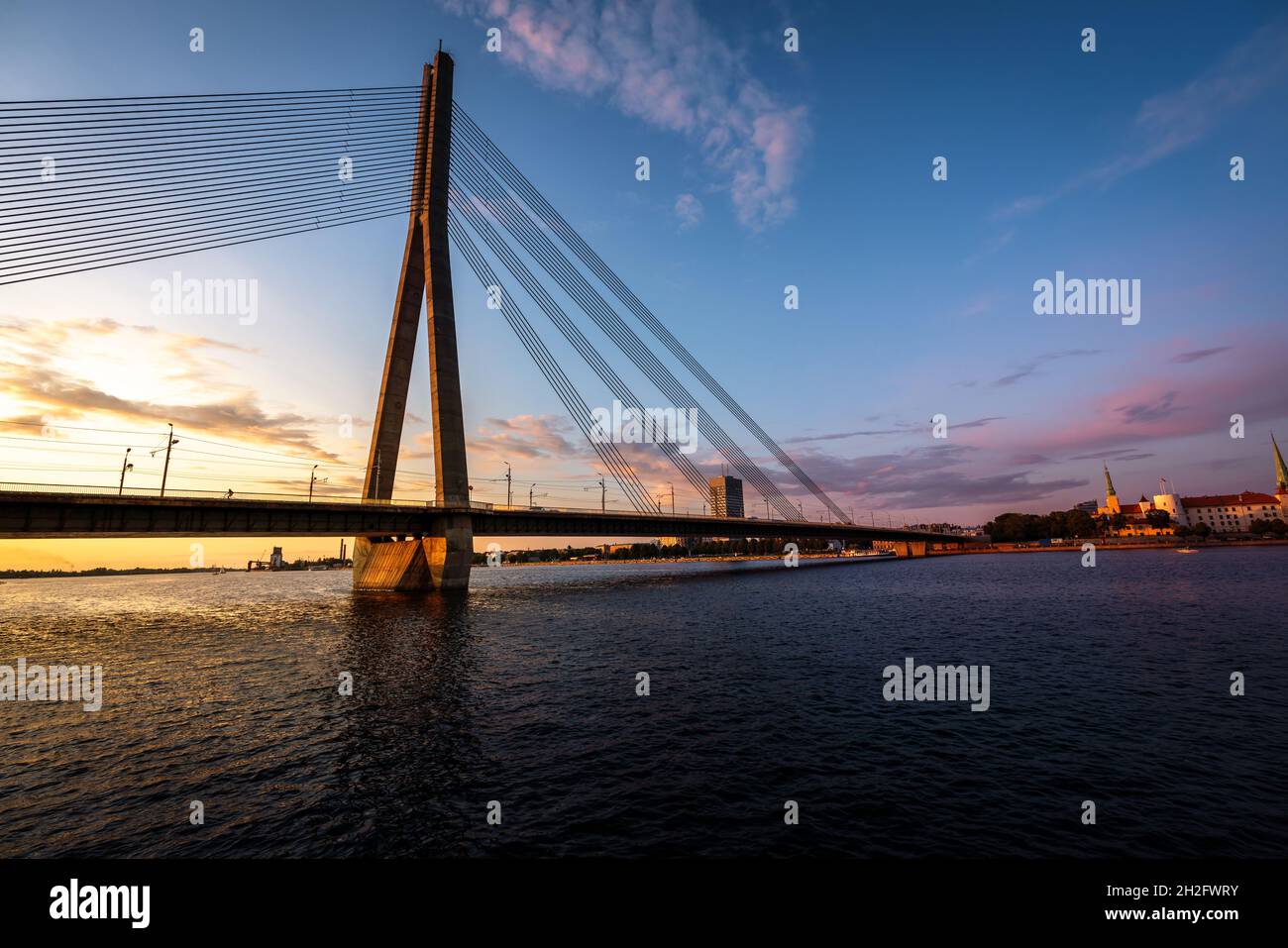 Vansu Bridge and Daugava River at sunset - Riga, Latvia Stock Photo