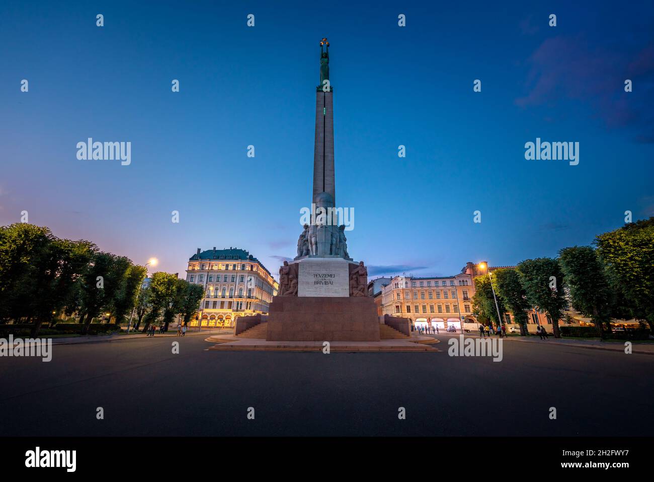 Freedom Monument at night - Riga, Latvia Stock Photo