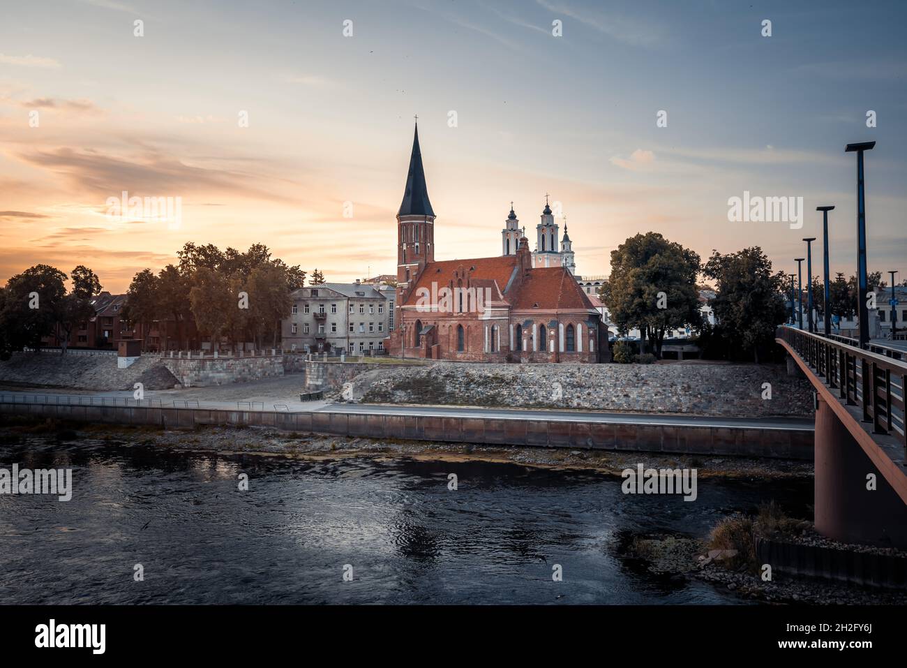 Church of Vytautas the Great and Neris River at sunset - Kaunas, Lithuania Stock Photo