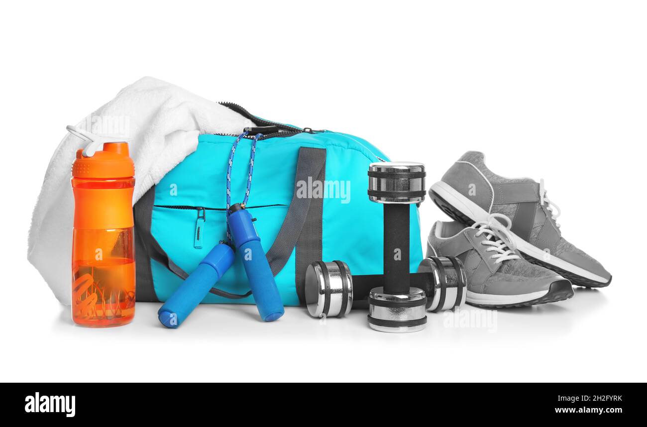 Sports bag and gym stuff on white background Stock Photo - Alamy