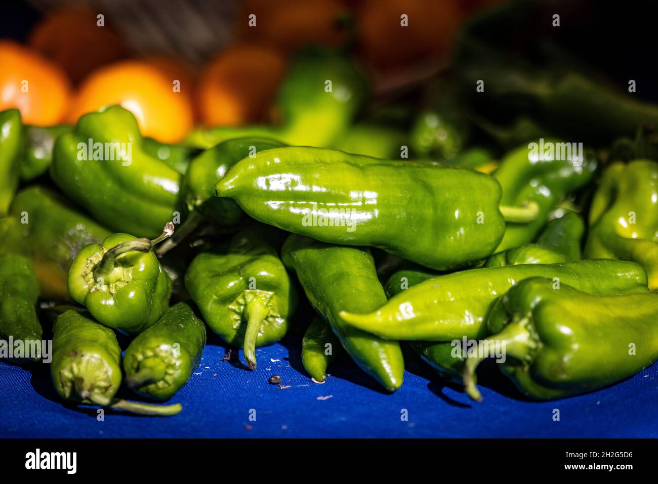 Green peppers on display at a farmers market in Union Square in New ...