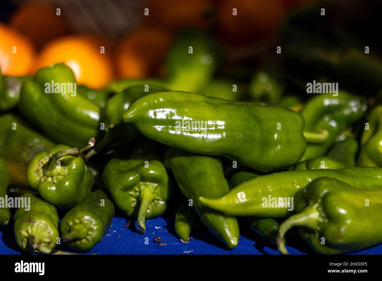 Green peppers on display at a farmers market in Union Square in New ...