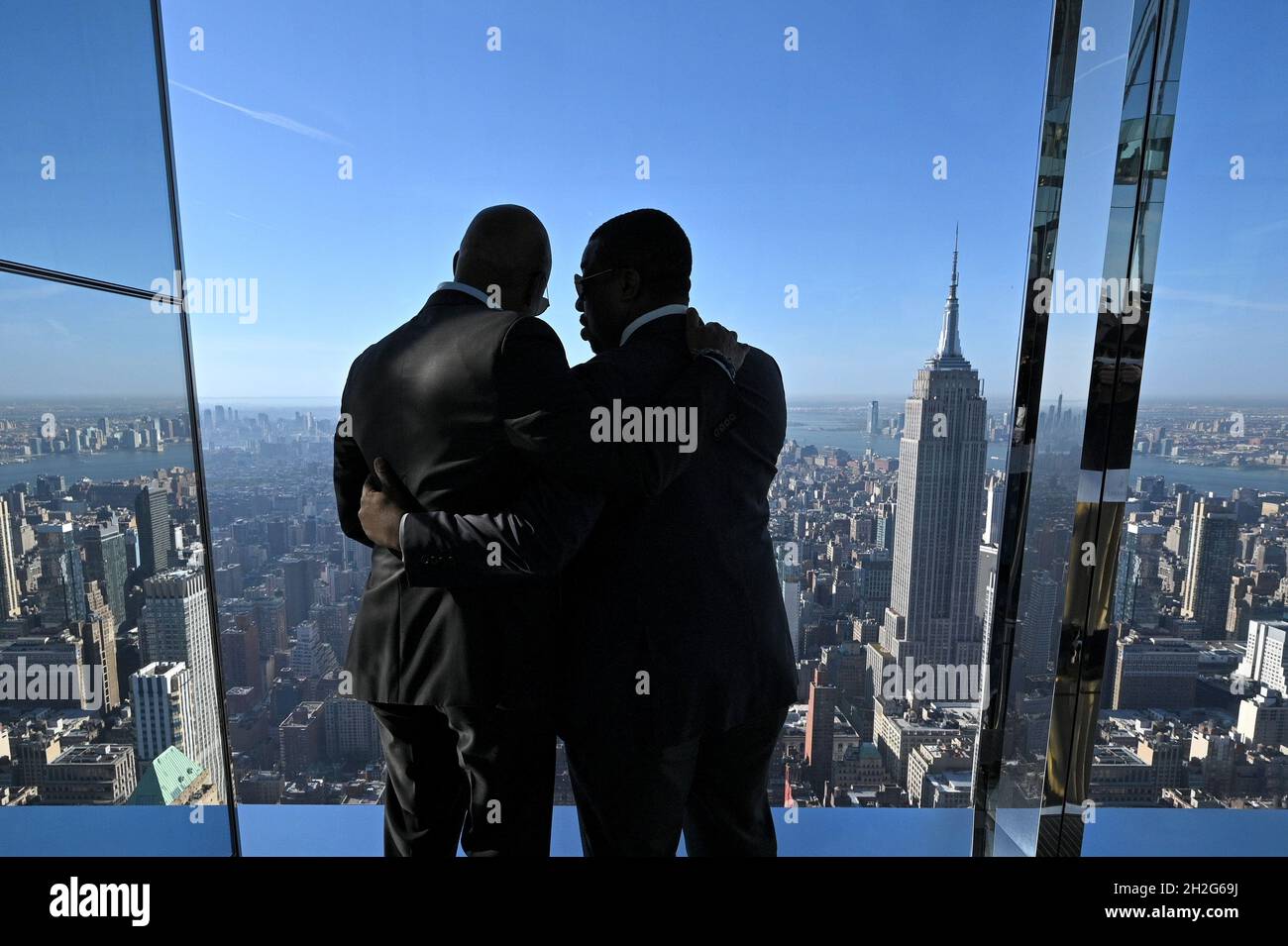 New York, USA. 21st Oct, 2021. (L-R) New York City Democratic Mayoral Candidate Eric Adams and New York Lt. Governor Brian Benjamin stand closely together as they talk during the ribbon cutting ceremony for Summit One Vanderbilt in New York, NY, October 21, 2021. Summit One Vanderbilt is an immersive experience and observation deck featuring the permanent 'Air' installation by Kenzo Digital, including an outdoor terrace, a glass elevator on the exterior of the building, and glass bottom booths overlooking Madison Avenue.(Photo by Anthony Behar/Sipa USA) Credit: Sipa USA/Alamy Live News Stock Photo