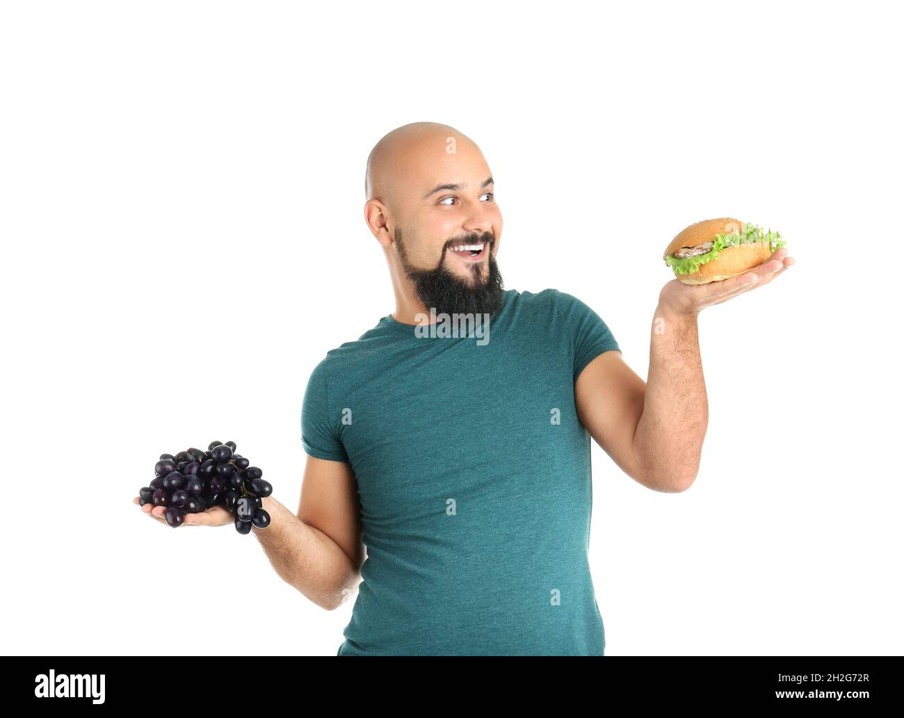 How Much Grapes Contribute To Obesity Reference: Overweight Man With Hamburger And Grapes On White Background Stock