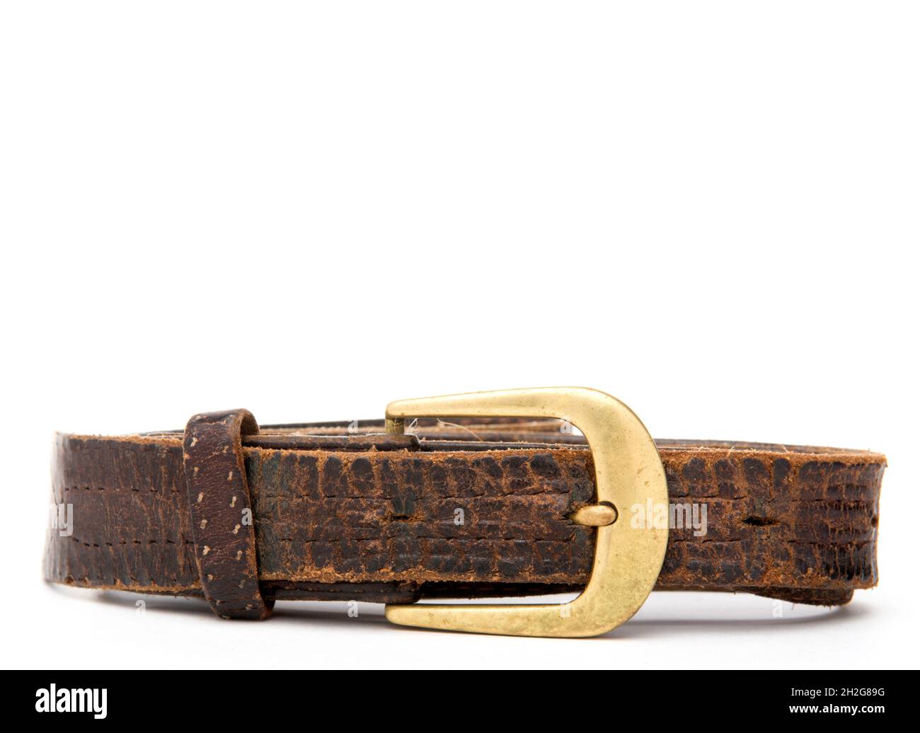 Rugged old Brown Leather Belt with brass buckle Isolated on White background Stock Photo
