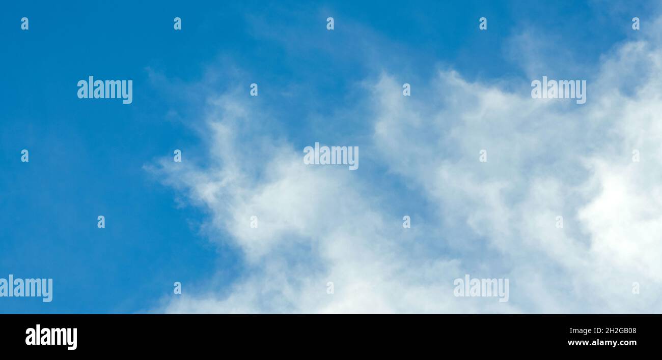 Blue sky background with white clouds. Panorama Stock Photo - Alamy