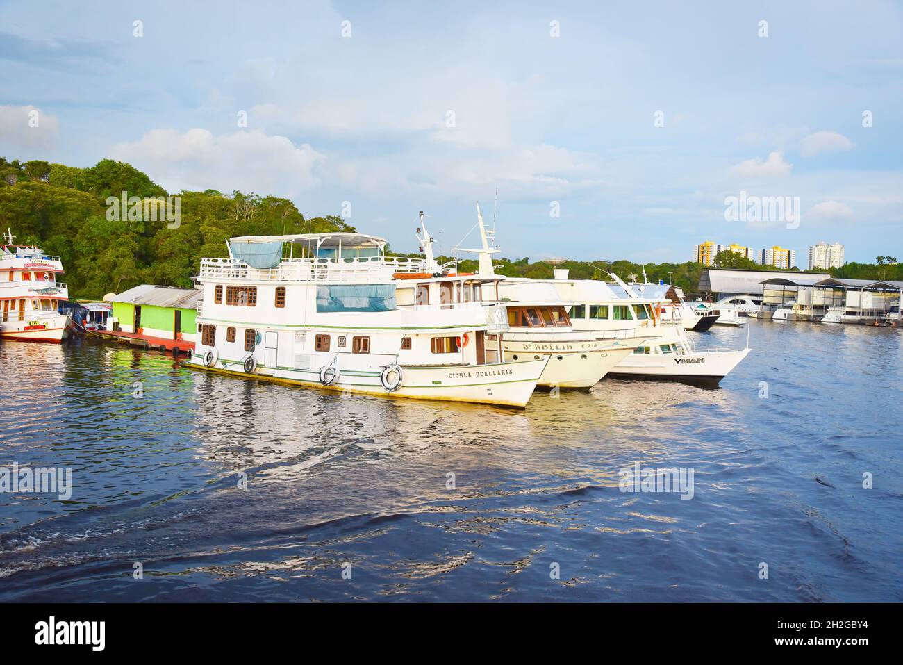 Fishing boats parking at Marina Do Davi along Taruma Acu River at