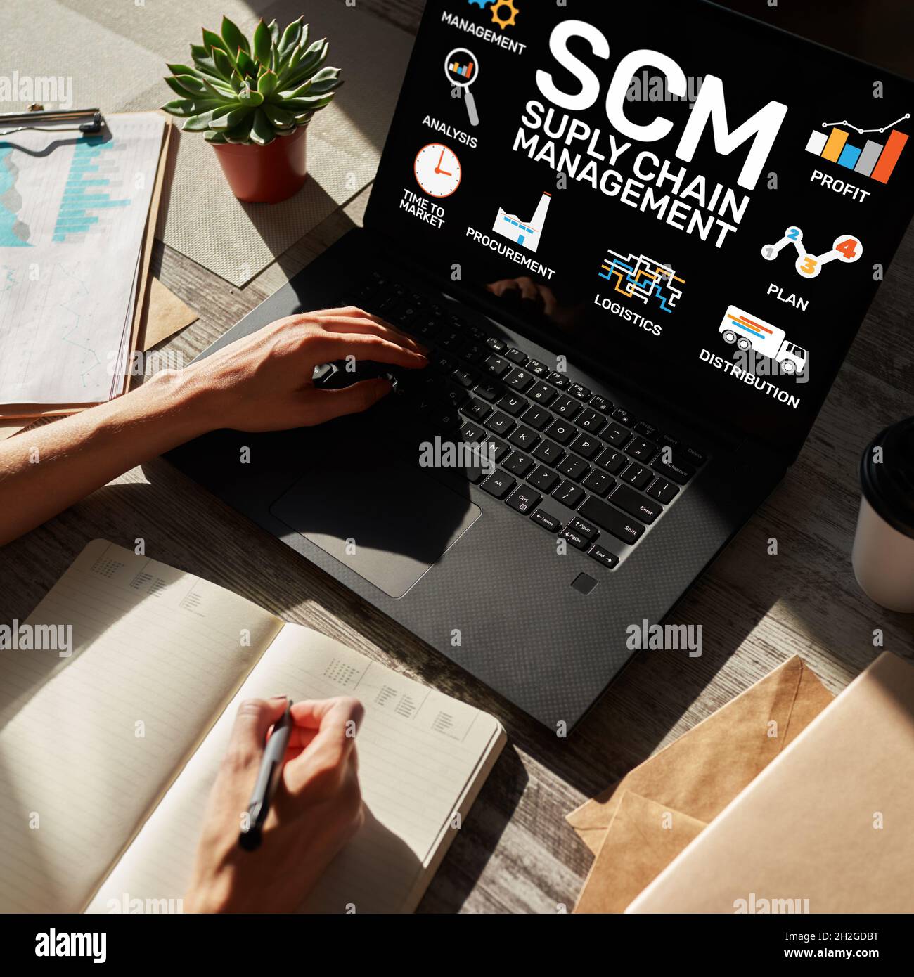 SCM - Supply Chain Management and business strategy concept on the screen. Stock Photo