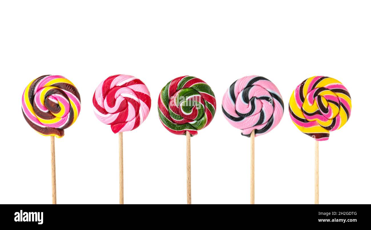 Different tasty colorful candies on white background Stock Photo - Alamy