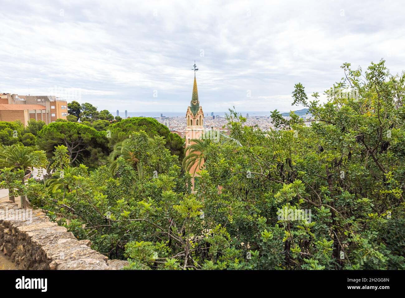 Barcelona, Spain - September 22, 2021: The steeple of the small village in Parc Guell. Park Guell is the famous architectural city art by Antoni Gaudi Stock Photo