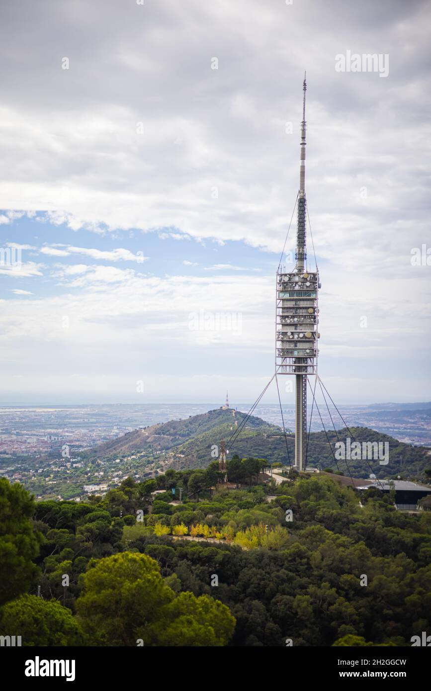 Barcelona, Spain - September 23, 2021: Panorama view of the TV tower, also known as Torre de Collserola,  designed tower located on the Tibidabo hill Stock Photo