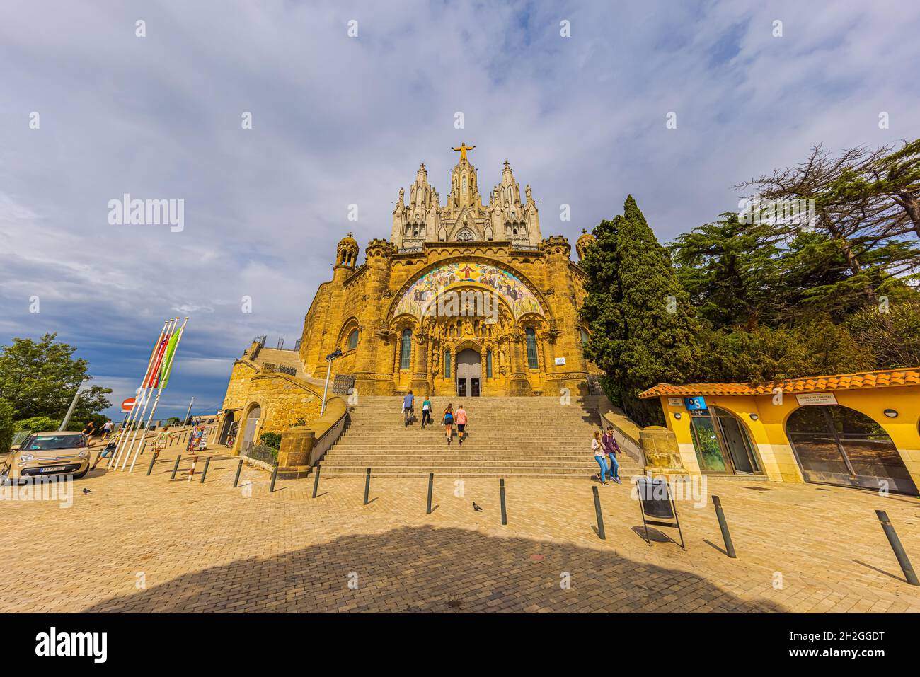 Wide angle capture of the entrance of the Temple of the Sacred Heart of Jesus at the peak of the Parc Tibidabo at Barcelona, Spain. Cathedral church w Stock Photo