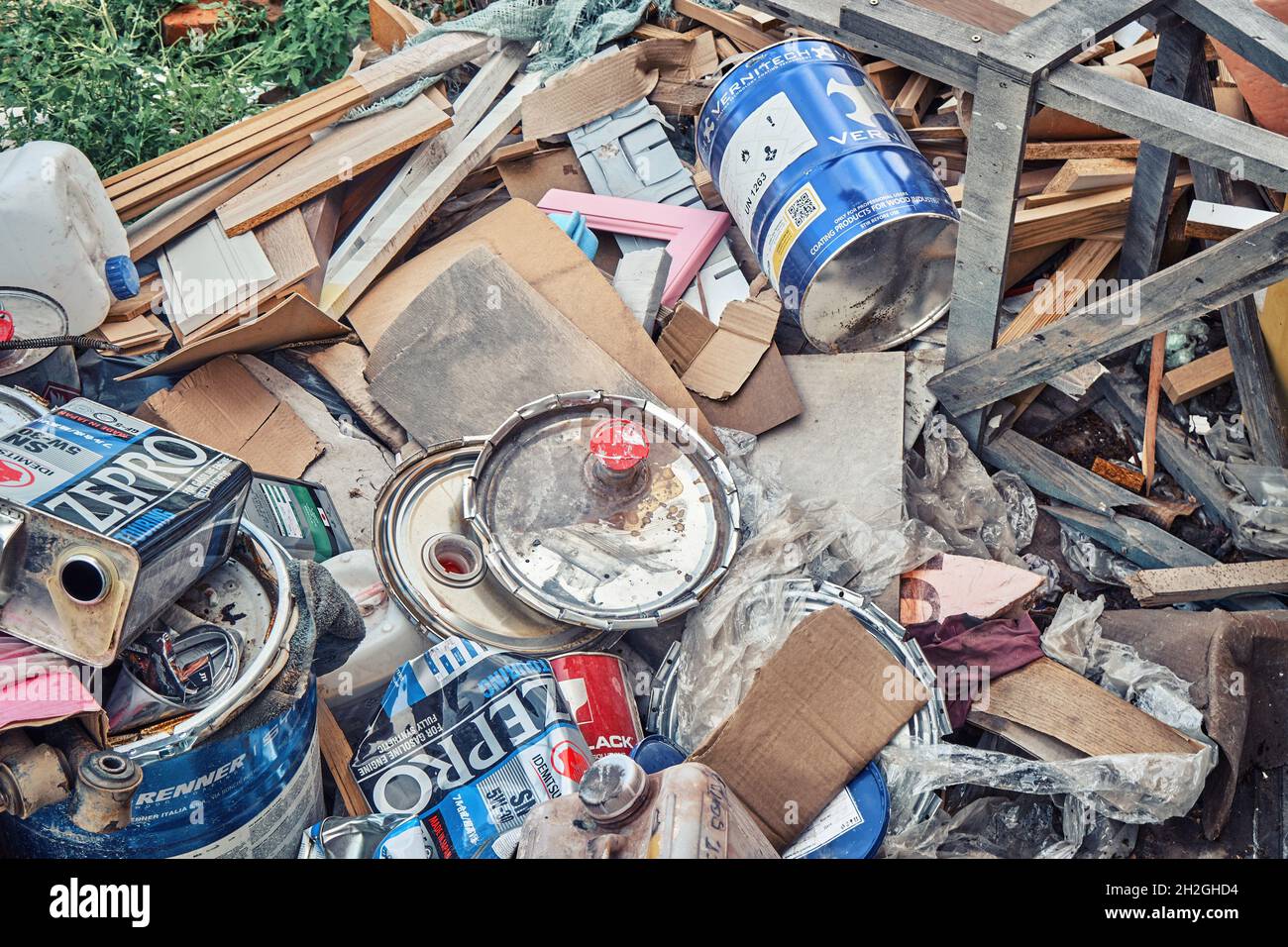 Izhevsk, Russia July 16 2021 Waste products. Used paint cans on pile