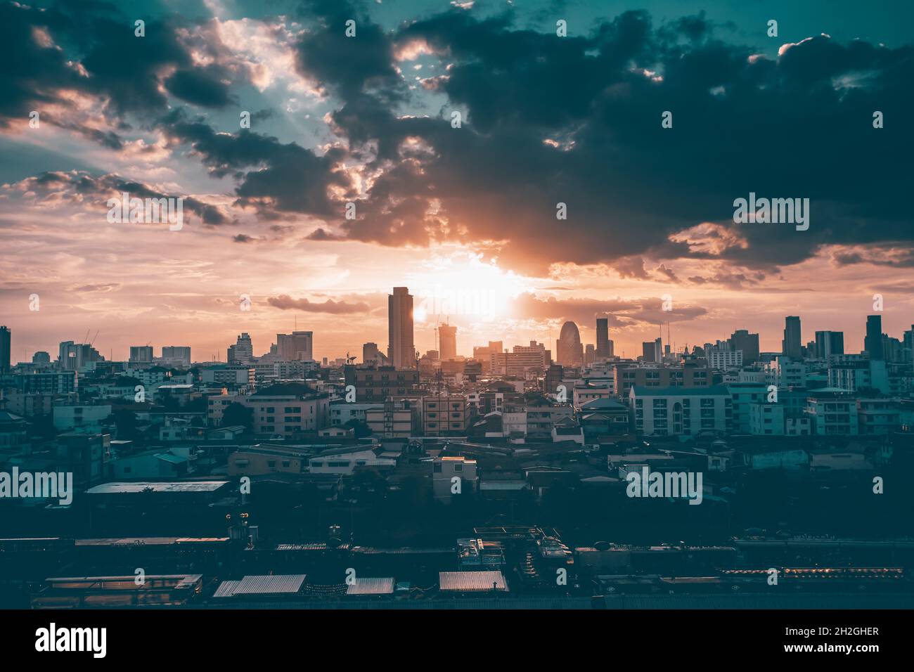 Sunset over Bangkok city business downtown Stock Photo - Alamy