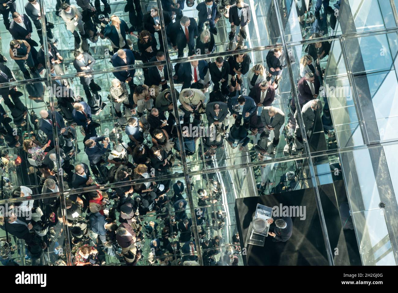 New York, NY October 21, 2021 Reflections in mirrors of SL Green CEO Marc Holiday speaks at