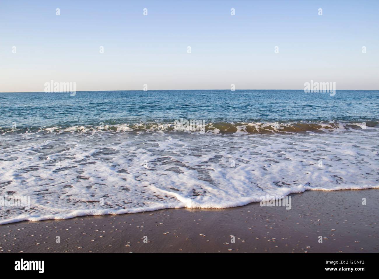 Beautiful seascape with sea waves and sand. Sea waves on the beach ...